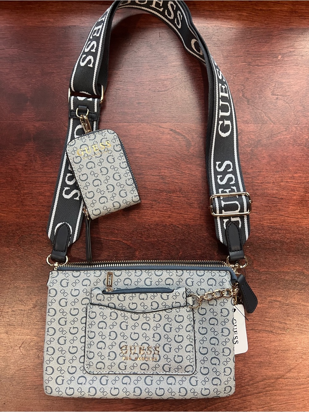 GUESS Light Blue Signature Crossbody with Branded Strap and Coin Pouch